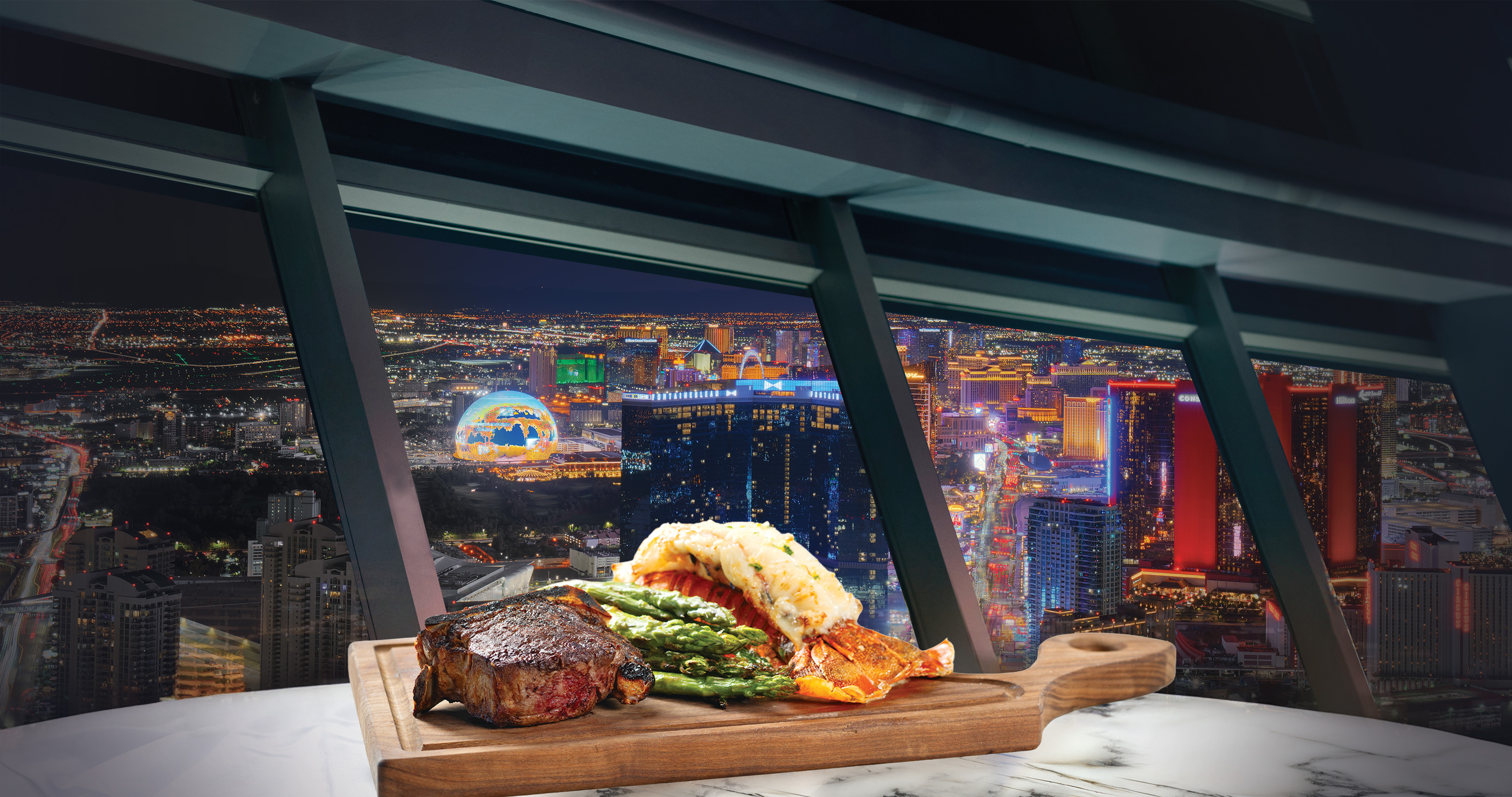 Steak and lobster at Top of the World Steakhouse