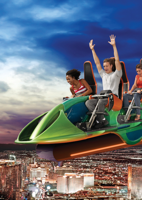 View at the top of the Stratosphere Hotel in Las Vegas, Nevada. The very  top of the tower, the 'Big Shot' ride, is pictured against a blue cloudy  sky. Copy space on